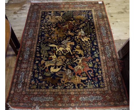 A Persian style carpet, decorated figures hunting leopards and other figures, on horseback, 212 x 152 cm