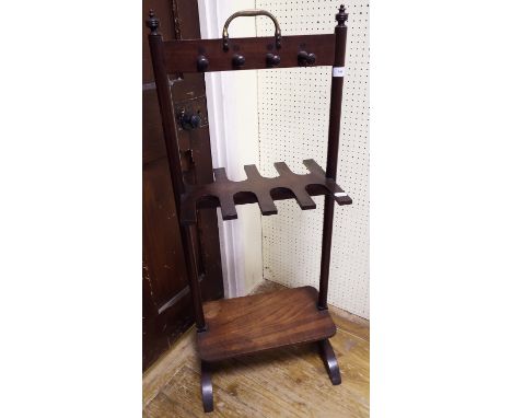 A mahogany whip, stock and boot rack with brass carrying handle, 46 cm wide