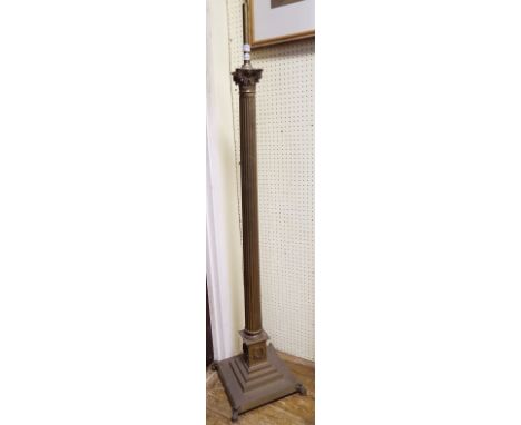 A brass Corinthian column standard lamp