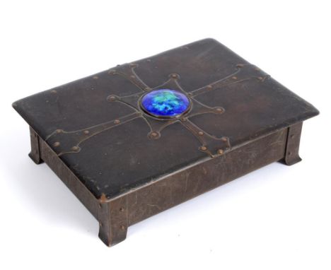 An Arts and Crafts copper box, the cover applied an enamel roundel, 20 cm wide  See illustration Condition report Report by R