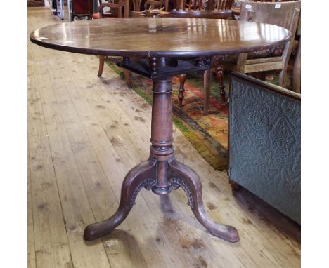 An 18th century Padouk wood tripod table, on a birdcage support (a.f.), 86 cm diameter Condition report Report by GH

Initial