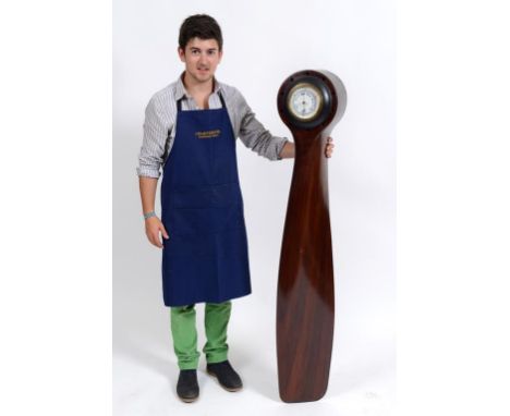 A wooden propeller section, inset a barometer, 152 cm high  See illustration