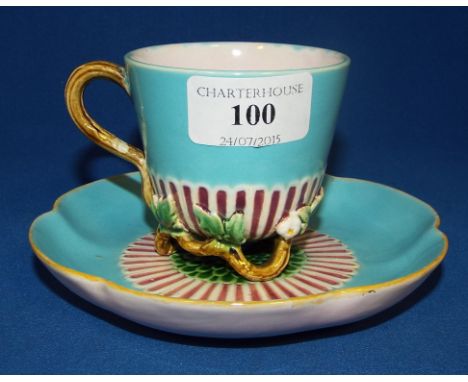 A Minton majolica cup and saucer, 1005 Condition report Report by RB

The cup: Some crazing, small glaze fault to interior of