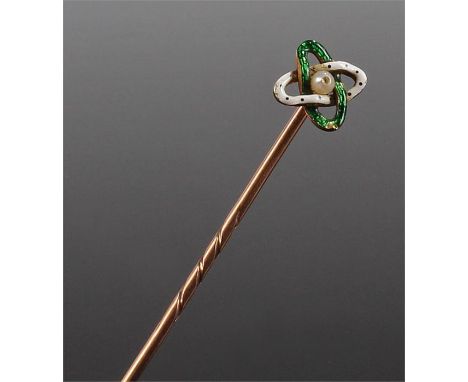 Yellow metal pearl and enamel stick pin, the central pearl with two swags of white and green enamel, within a stick in box