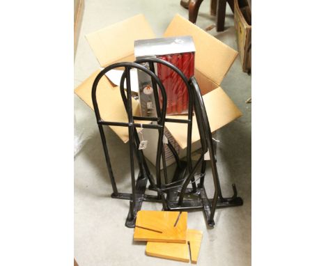 Box of Candles, Three Metal Saddle Racks and a Glass Book Trough with Wooden Ends