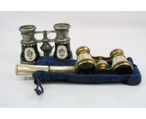 Two pair of vintage opera glasses to include a mother of pearl and brass example.
