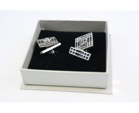 A pair of silver and enamel Tiffany style cufflink's.