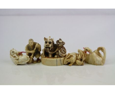 Ivory netsuke of two rabbits, h :3 cm, another of a horse emerging from a bean pod, signed, l: 5cm,  another of a man holding