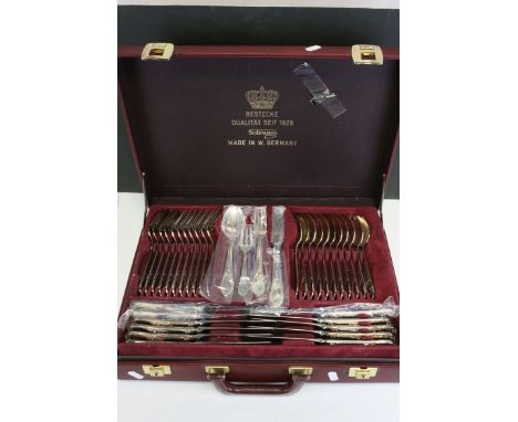 A cased Soligen model 25/540 cutlery set with original warranty and price.