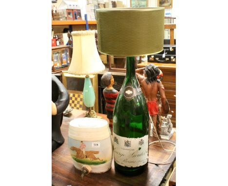 Pottery Sherry Barrell with printed Horse Racing design, 28cms high together with George Gould Remins 9L Champagne Bottle con