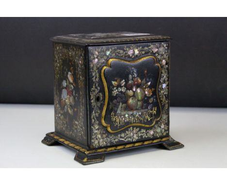 19th century Lacquered Papier Mache Table Top Cabinet decorated with Mother of Pearl and Gilt Floral Sprays, the single door 