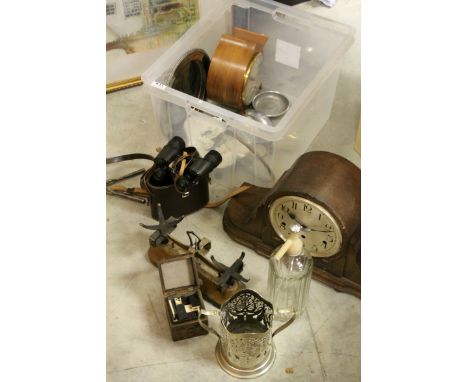 A box of sundries to include binoculars, mantel clock, bottle stand etc.