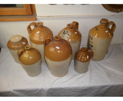 Six Stoneware Flagons, impressed marks including Calne, Marlbro, Westbury and Chesterfield plus another with marked ' Shootin