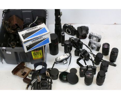 A large quantity of cameras and accessories to include Ilfold, Canon, Kodak, Lenses ,Watches etc.