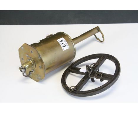 A 19th century brass spit jack with hanging ring.