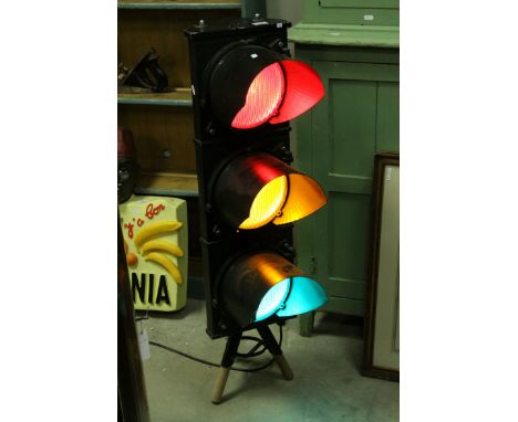 Freestanding Light formed from a Traffic Light raised on tripod base, 104cms high