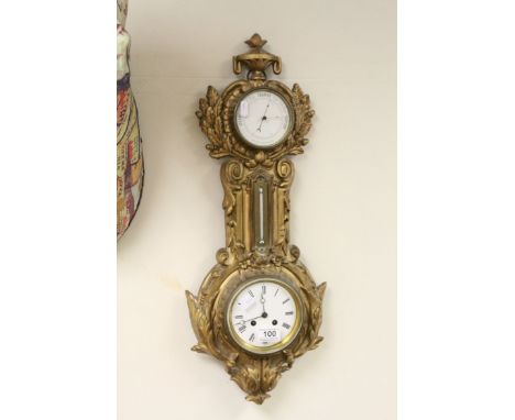 Late 19th / Early 20th century Clock, Barometer and Thermometer, all contained within an Ornate Gilt Metal Case, 70cms high
