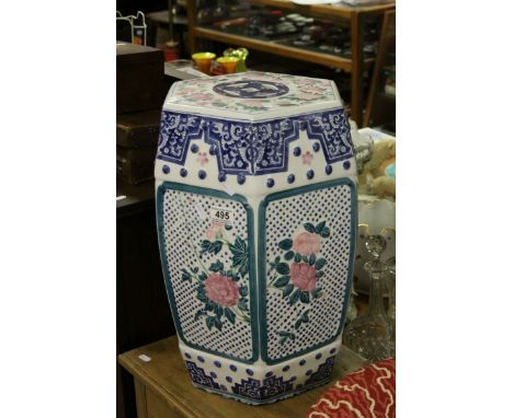Chinese Ceramic Hexagonal Seat with faux pierced decoration and floral designs.