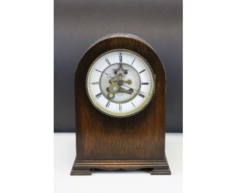 Early 20th century Domed Oak Cased 8 Day Mantle Clock, the white enamel face mark ' John Hall, Manchester ', with key, 31cms 
