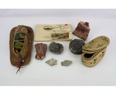 A collection of vintage American collectables to include native american arrow heads and a selection of fossils.