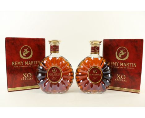 Cognac: Remy Martin Fine Champagne Cognac X0 Special, 2 Bottles (in presentation boxes). (2) 
