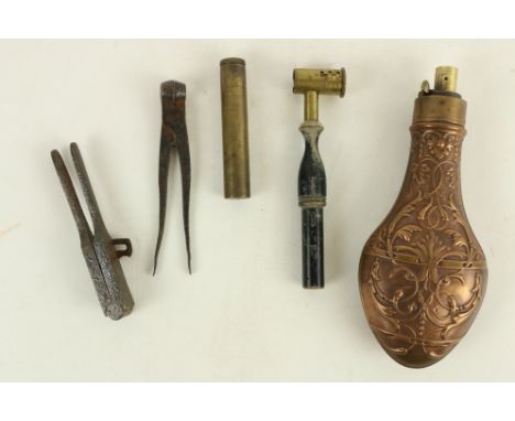 Militaria:&nbsp; A collection of various Accoutrements to include: decorated brass powder flask and bullet moulds, as a lot, 