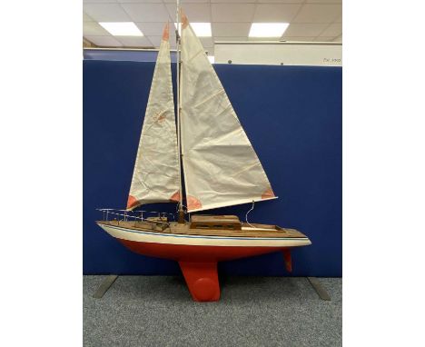 SCALE MODEL YACHT - 'Del Bach', of wooden construction, with cream and red hull, red weighted keel with remote control electr