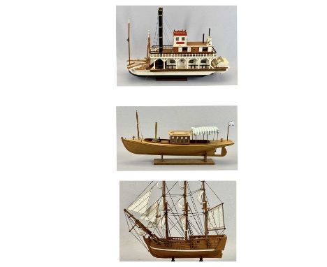 SCALE MODEL PADDLE STEAMER - with twin funnels, the hull painted cream and black, with stand, 39cms H, 56cms L, STEAM LAUNCH 