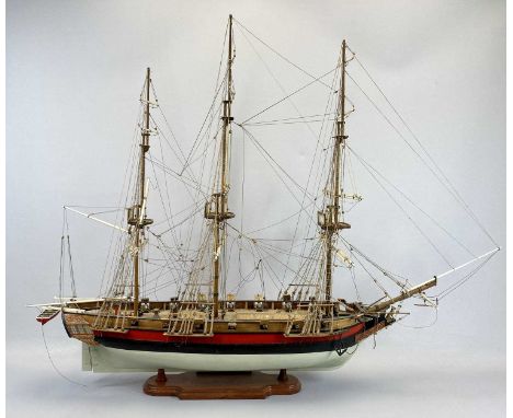 SCALE MODEL THREE MASTED SAILING SHIP - of wooden construction, the hull painted red, black and cream, fully rigged and with 