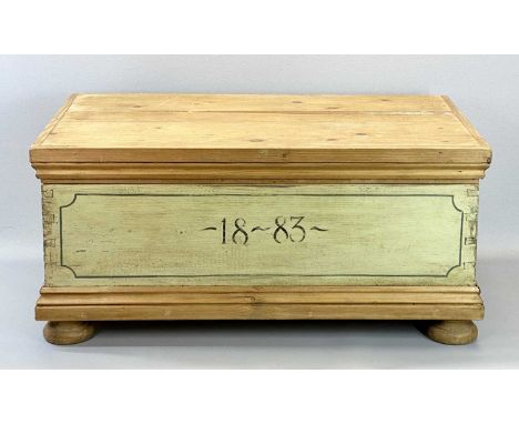 RECTANGULAR PINE TRUNK - partially painted and dated 1883, with iron side handles, 36cms H, 78cms W, 47cms D