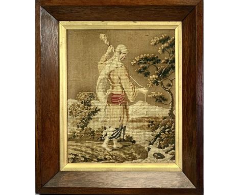 19TH CENTURY NEEDLEWORK TAPESTRY - figure alongside a stream, in a rosewood frame, 58 x 50cms overall