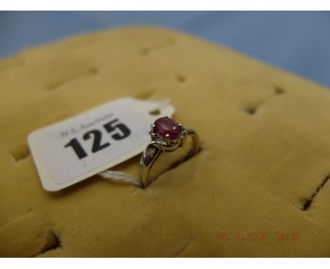 A 9ct white gold &amp; ruby ring size N