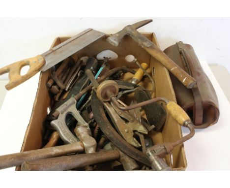 A large collection of vintage tools to include Axes, saws and drills plus a Small Gladstone Bag 