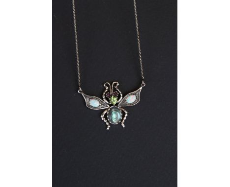 Silver bug necklace, set with opal panel and ruby eyes 