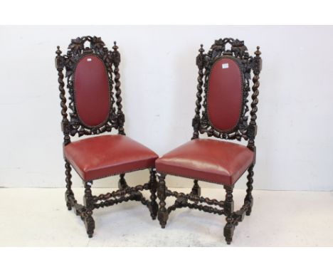 Pair of Victorian Oak 17th century style Chairs, the frames heavily carved with fruits and foliage, barley-twist supports, an