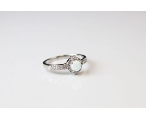 Silver and opal set dress ring 