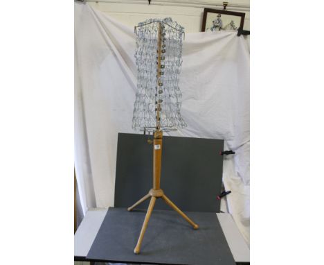 Vintage wire dressmakers mannequin on a pine stand 