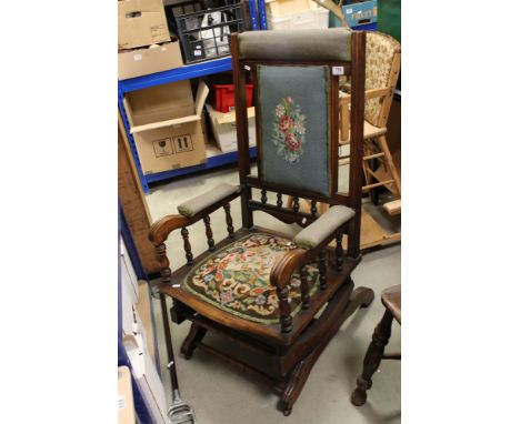 Victorian American Rocking Chair with needlework upholstered back panel and seat 