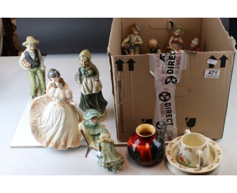 A group of mixed ceramics to include Poole pottery and Royal Doulton. 