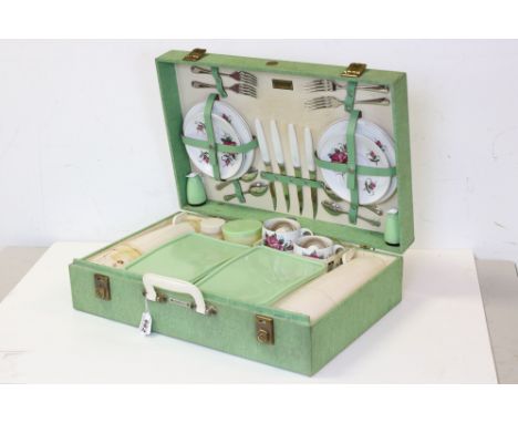 A vintage mid century Brexton picnic hamper with contents. 