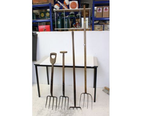 Four early vintage gardening tools, to include two forks, a pitchfork &amp; a potato lifter 