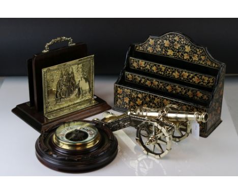 A group of mixed collectables to include a barometer, a brass canon and a pair of letter racks to include a lacquer example. 