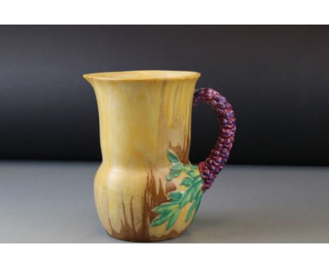 A Clarice Cliff Celtic Harvest pattern Jug, 19 cm in height. 
