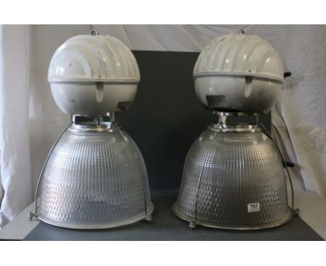 A pair of Holophone industrial hanging light fittings with substantial glass shades, height approx 60cm, diameter approx 40cm