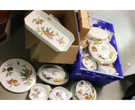 A large Royal Worcester Evesham pattern dinner service to include Turens, flan dishes, jugs and plates. 