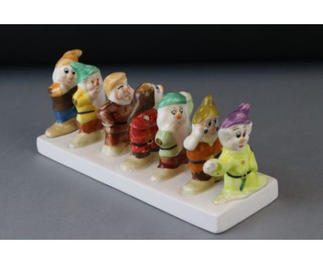 Ceramic Toast Rack in the form of Walt Disney's Seven Dwarfs (from Snow White ) 