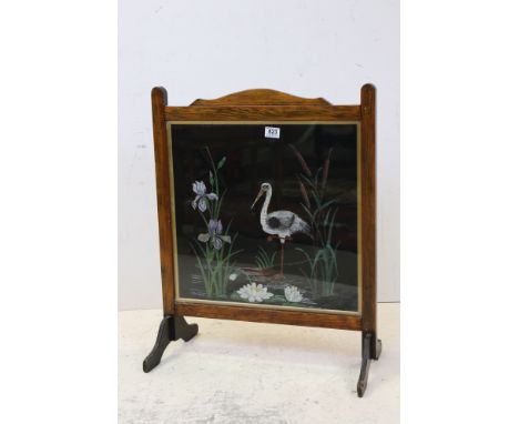Early 20th century Oak Framed Firescreen with embroidered Stork and Bull Rush Panel, 59cms wide x 72cms high 