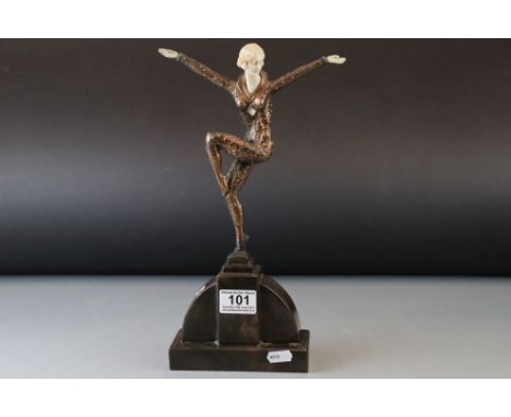 Art Deco Faux Bronze and Ivory Figurine in the manner of Chiparus, 33cms high 