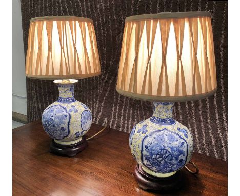 TABLE LAMPS, a pair, Chinese famille jaune ceramic with carved wooden bases and shades, 42cm H. (2)