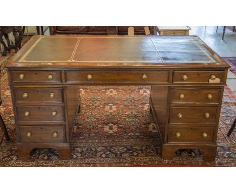 PARTNERS DESK, Victorian mahogany with tooled leather writing surface above nine drawers opposing dummy drawers and panelled 